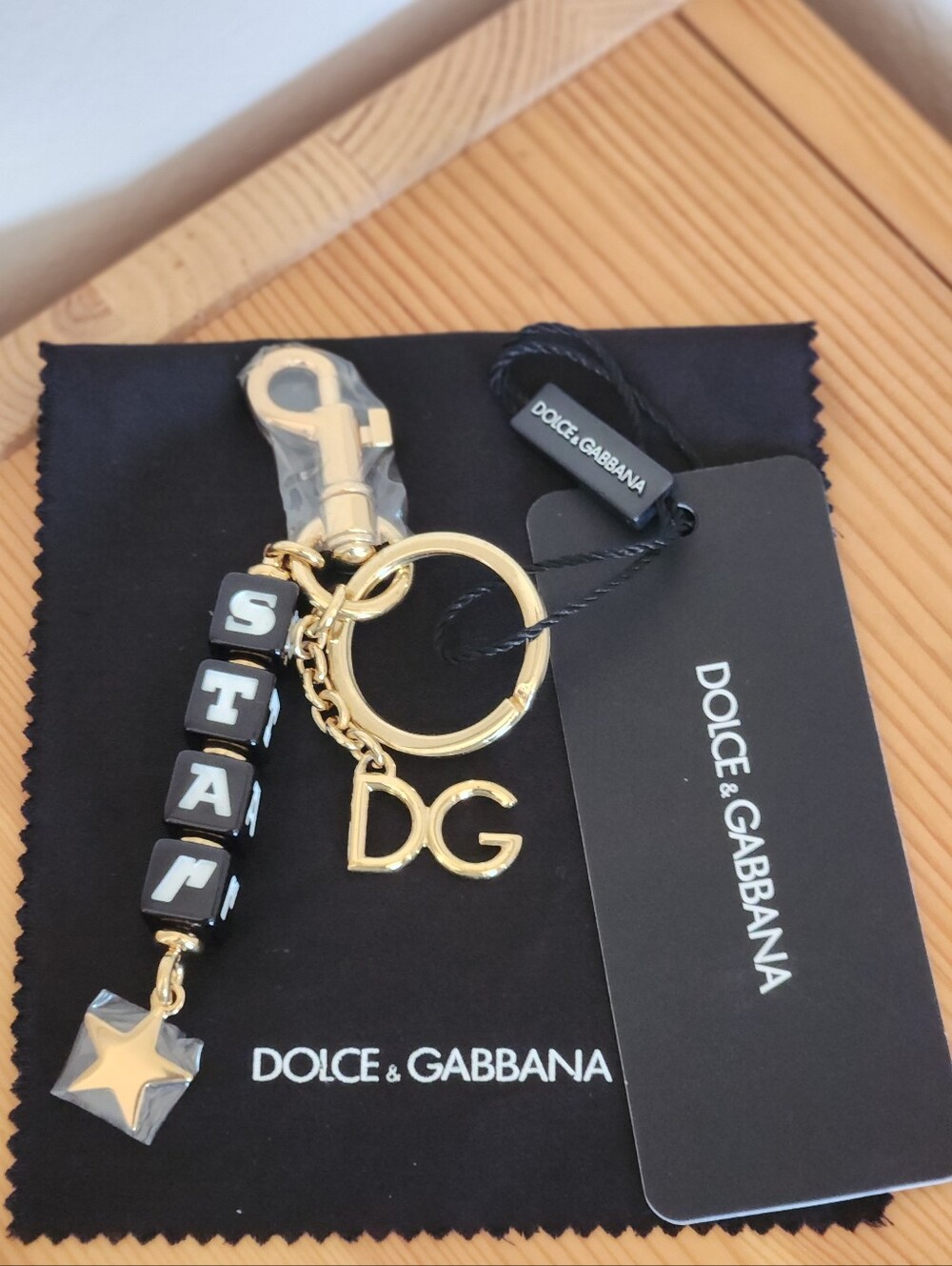 Dolce & Gabbana Black and Gold 'DG' Charm Keychain With Dust Cloth